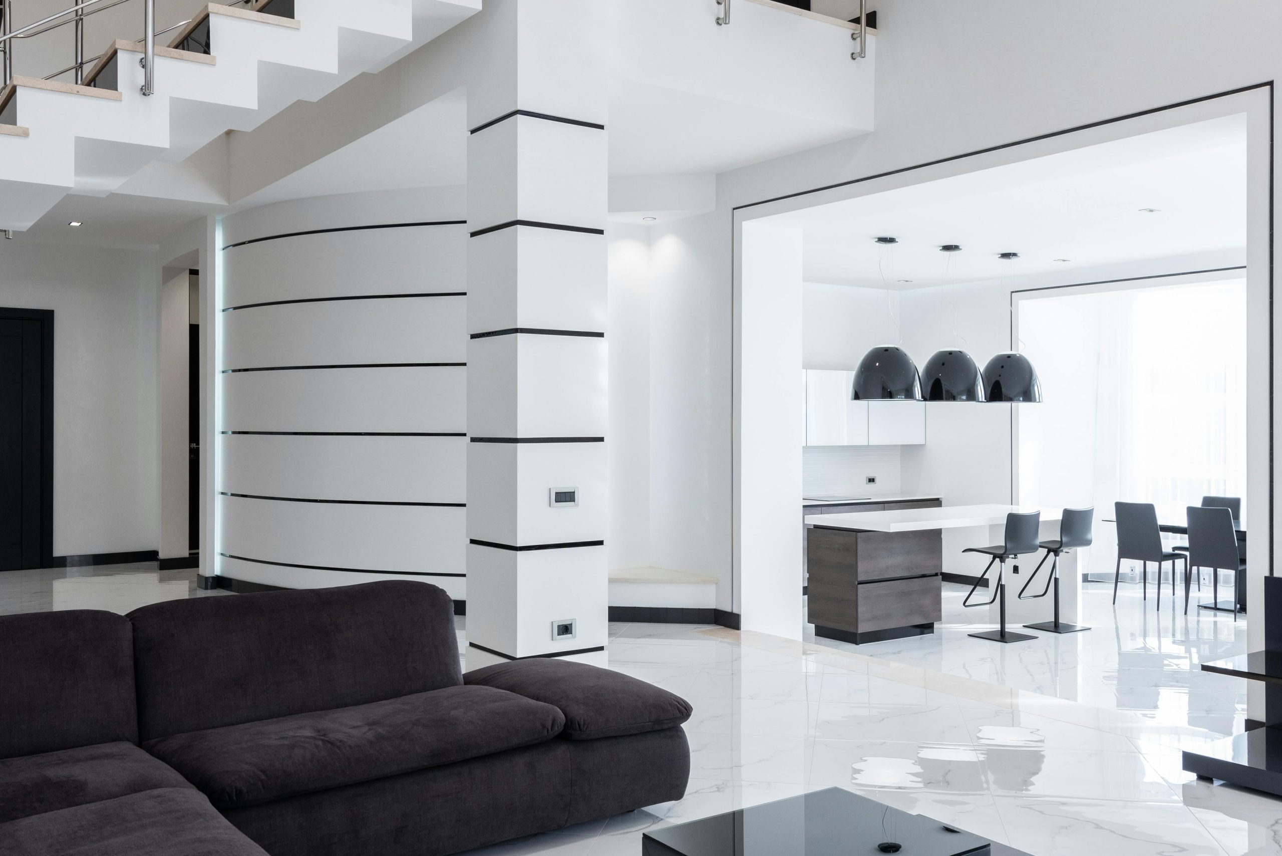 Sleek and stylish modern apartment with minimalist decor and luxurious furnishings.